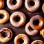 Placeholder: donuts landscape, realistic, warm colors, chocolate, sugar