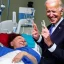 Placeholder: joe Biden laughs at cancer patients crying in hospital