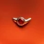 Placeholder: A close-up of a red stone ring on a pedal, Macro lens, highly detailed