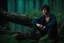 Placeholder: evan buckley as 17 year old male with short dark hair and blue eyes sitting on a log , photorealistic, 4k, dark fantasy