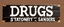Placeholder: a hand painted sign on dark painted wood planks, first line says "DRUGS", second line (Smaller) says "STATIONERY T SANDERS", on a brown background