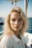 Placeholder: half body portrait of a cute model blonde hair woman on a yacht, shot on kodak gold 400