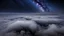 Placeholder: looking down from space at the mist and clouds, surrounded by the mist at night starry sky.