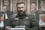 Placeholder: russian rebel leader giving a speech on social Media