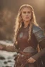 Placeholder: A beautiful woman with blond hair, viking braids Brown leather armor.