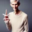 Placeholder: a full picture of a tall rattled skinny man with short dry hair in a light color wearing a knitted sweater with long boney fingers