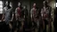 Placeholder: 4 men zombies in adark room bloody help stand behined themselves