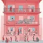 Placeholder: A vertical cross section of a multi-story building showing various rooms and inhabitants, including a person in a red shirt reading at a desk, another person dressed in pink washing clothes, and an elephant in a room with a red wall, with a sky sunny outside