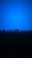 Placeholder: A field of random people at the end of the picture a blue dark background an object in a cinematic, 8k