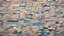 Placeholder: Texture of disorganized beige and blue brick wall backgorund