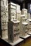 Placeholder: A white city made out of speaker boxes painted by Paul Ranson