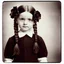 Placeholder: wednesday addams as a child, braids, with black roses, worn polaroid, 1970s