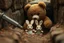 Placeholder: generate a big plush bear and a smaller plush rabbit in a trench, fighting against enemies. Those enemies schould be diffuse, without faces. The plush bear and the plush rabbits are in action