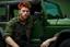 Placeholder: Young rugged looking male with red hair and green eyes sitting in a jeep close up photo realistic