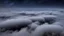 Placeholder: looking down from space at the mist and clouds, surrounded by the mist at night starry sky.