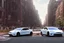 Placeholder: A Tesla 'Model S' is racing at top speed, near the 'Central Synagogue' in New York City. (CINEMATIC, WIDE ANGLE LENS, PHOTO REAL)
