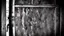 Placeholder: unhinged door, anime, monochrome, black background, ink, simple, maximum quality, broken hinge, barely functioning, why is it still being used it's a health hazard, centered on frame, far