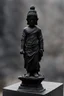 Placeholder: an ominous small statue made of black stone