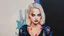 Placeholder: Suicide Squad Harley Quinn Margot Elise Robbie Pop Art psychology oil paiting In depth psychology display Roy Fox Lichtenstein style, dream, symptom, image in the background in the city artgerm display Gustav Klimt style artgerm display in the Barcelona the 2024th century oil paiting. and the city itself seemed like a big illusion, full of light and shadows. Barcelona city the 2024th century