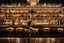 Placeholder: a chic and stylish fashionable lady sitting on tall barstools at a vintage bar, viewed from the back. On the counter in front of she stands a cocktail, pale lights. The bar backdrop features rows of bottles and glasses on shelves and in vitrines. high detalied, high realistic, professional photo