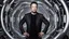 Placeholder: "A captivating image blending the brilliance of tech pioneer Elon Musk with cutting-edge artificial intelligence technologies. Musk is clearly visible, facing the camera with a confident smile that reflects his assurance and enthusiasm. Amidst his face's candid charm, advanced robotic elements are integrated, showcasing the synergy of human ingenuity and AI advancements. This image embodies the perfect balance between humanity and technology, echoing Musk's visionary approach to shaping the futu