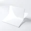 Placeholder: A photo of a white folded card, 5.5 by 4.25 inches. The card is laying vertically on a beautiful white surface.