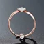 Placeholder: delicate thin ring with baguette diamond, knot, rose gold, thin ring