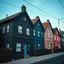 Placeholder: Fotografia di strada assurda e falsa a Magog blu weirdcore dai colori vivaci. Sfasato. Non luogo falso, inusuale. Max Ernst. Le case sono false e dipinte di nero chiaro con cose stilizzate e dettagli. Ci sono finestrelle false quadrate, che danno un senso distopico e molto surreale, disposte in modo casuale. L'atmosfera generale sembra noiosa e onirica, con un contrasto tra elementi reali ed elementi dipinti falsi, René Magritte