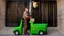 Placeholder: UPS delivery man with green crocs is at the gate