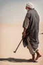 Placeholder: An old man wearing an Arabic keffiyeh, his back bent, walking barefoot, holding his cane upside down, looking back and holding his shoe in his hand.