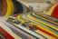 Placeholder: A reddish gray highway with speeding cars painted by Wassily Kandinsky