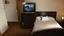 Placeholder: Broken TV sparking in hotel room