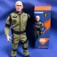 Placeholder: Mike Pence G.I. Joe toy Doll spaceforce uniform, orange blue fabric, guns, wall packaging for sale, bright pricetag, empty box