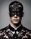 Placeholder: realistic fashion editorial photo, a face shot of a healthy 18-year-old muscular male dressing up in a symmetry bejeweled black haute couture diamond and pearl lace satin mask inspired by Día de los Muertos, solid white backdrop, studio lighting