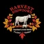 Placeholder: an autumn colored textured cloth embroidered ornamental leaves and cattle, pointed bottom, on dark background, embroidered text across top "HARVEST SHOWDOWN" block text, below is more embroidered text "Heartland Livestock Services" ," Futurity Heifer Show", Canadian western cowboy style