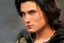 Placeholder: a young male with shoulder length black hair and green eyes, smirk