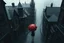 Placeholder: top-down view of a grayscale wet city street with old tall haunted houses, rain, little dark human siluette with red umbrella, surreal style, dark mood