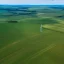 Placeholder: Aerial Drone Footage of Wind Turbines in Rural Area with Green Forests and Fields