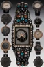 Placeholder: Black wristwatch set with precious stones