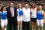 Placeholder: Overweight white politician next to a group of athletes