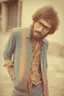 Placeholder: hippie young man with glasses of colours and poor and short short short and poor hair on the head with receding hairline. Farsightedness glasses with big eyes. Shirt beard in the head. Vintage look and feel like photo style-of the 70s