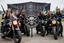 Placeholder: a very hard and tuff motorcycle young gang with viking hair, not old, posing with their Harley Davidsson bikes, some of them holding guns and shotguns, a logo sign with Falköpings HD Club, "Fearless sinners" Skulls and bones, skeletons and fire, Sweden vikings DEMONS, Swedish flags on bikes