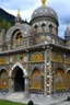 Placeholder: A gray monastery made out if steel designed in Ica stones painted by Gustav Klimt