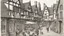 Placeholder: A Paved Courtyard, With Tudor Gothic Houses, Tall twisted Chimneys, twisted Roofs, People, Shops,