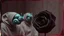 Placeholder: The Watchers with blue snails and black rose of the Empty Room, augmented reality, pantomim, masks, eerieland, abstract surrealism, glitter, calotype combineted transparent burgundy and pastel mint color, tintype , performance art