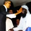 Placeholder: barack oboma giving osoma bin laden a high five