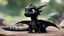 Placeholder: a cute black baby dragon in real life from the movie How to Train Your Dragon