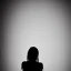 Placeholder: B/W A silhouette of girl between the age of 21-24 afraid white background