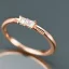 Placeholder: delicate thin ring with baguette diamond, knot, rose gold, thin ring