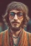 Placeholder: Hippie bohemian young man with Parisian bohemian look and glasses of colours and poor and short short short and poor hair on the head with receding hairline. Farsightedness glasses with big eyes. Long beard. Vintage look and feel like photo styleof the 70s